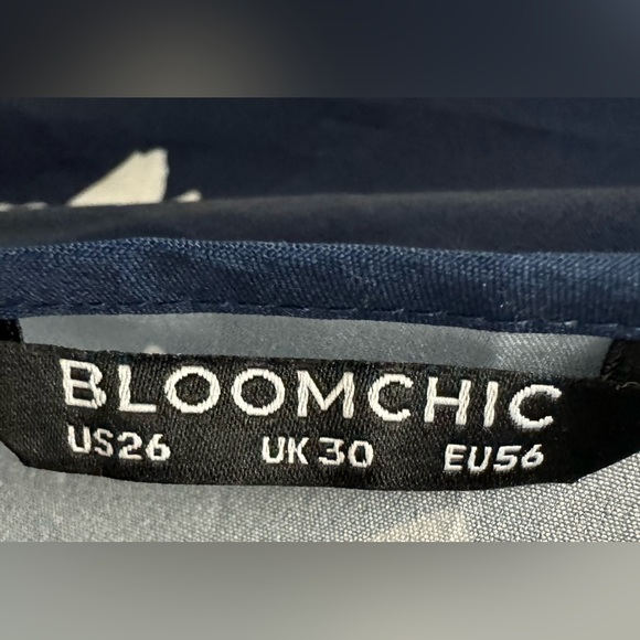 BloomChic NWOT navy floral top with 3/4 length sleeves with a ruffled cuff. 26 - Picture 7 of 8